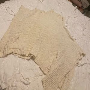 Cream turtleneck poncho sweater